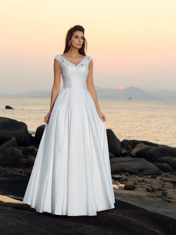 A-Line/Princess Taffeta Long V-neck Sleeveless Beading Beach Wedding Dresses